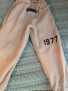 Essentials Cream Sweatpants with Black '1977' Graphic
